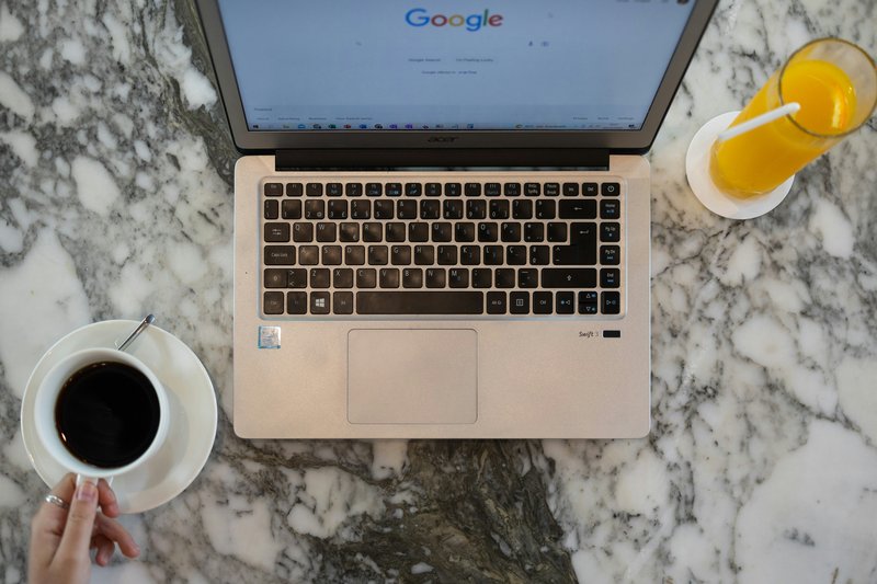Laptop displaying Google search diagnostic results