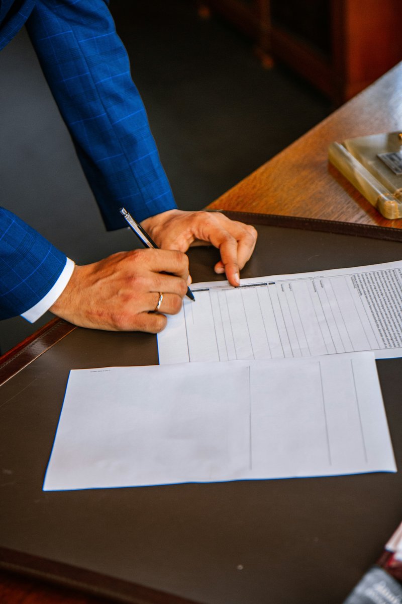 Business desk with notepad and audit checklist